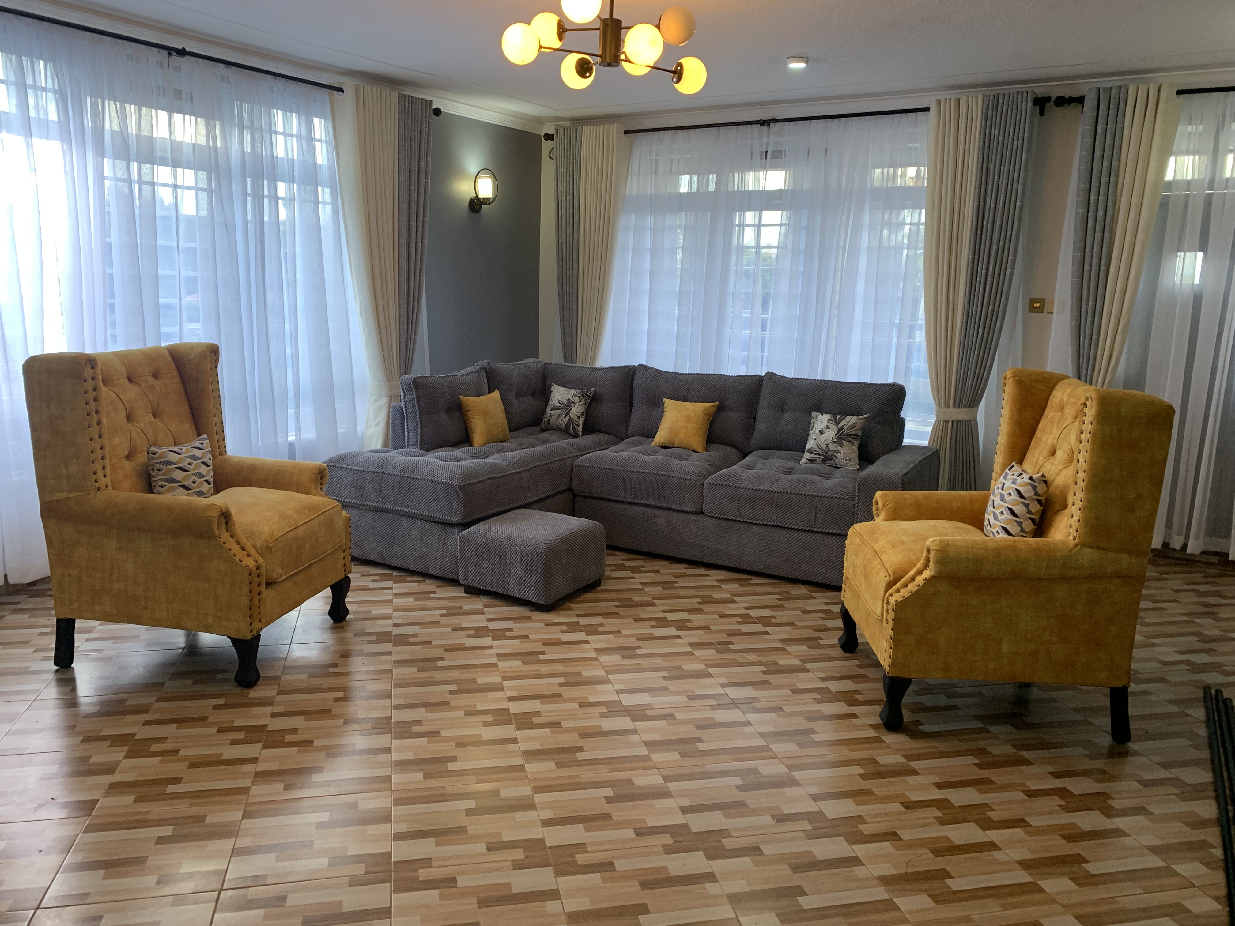 Six seater sectional sofa and two arm chair (8 seater set)